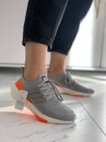 آدیداس طوسی پشت نارنجی